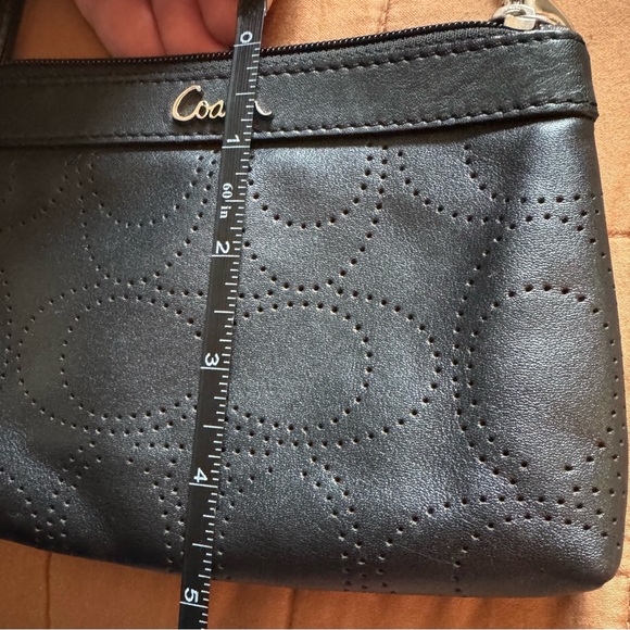 Sophisticated Coach Black Perforated Wristlet - Picture 13 of 13